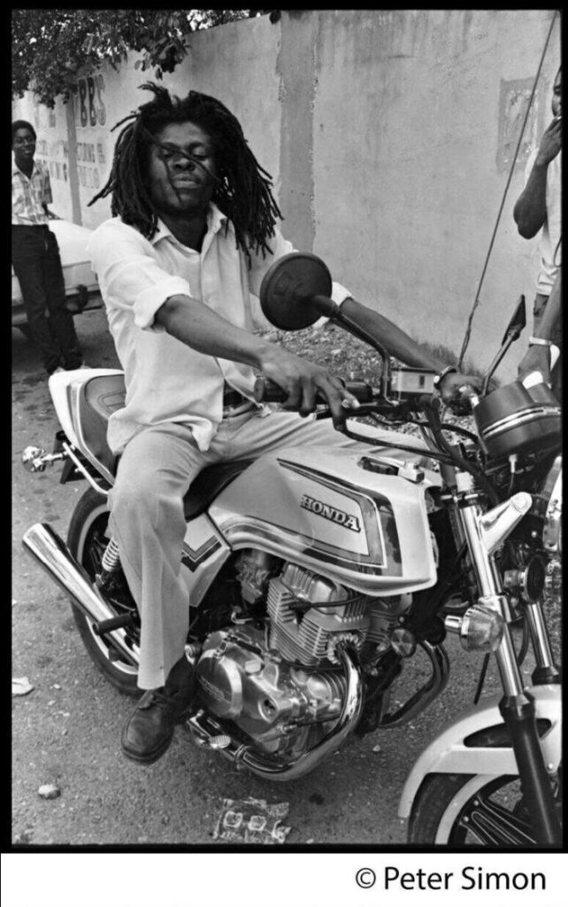 Dillinger on motorcycle - Photo by Peter Simon